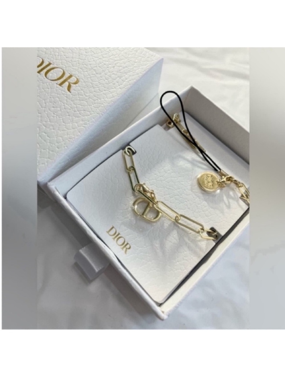 Dior beauty gift phone charm